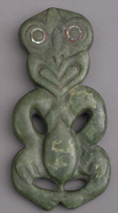 Appraisal: MAORI CARVED GREEN STONE HEI-TIKI The flattened zoomorphic figure with