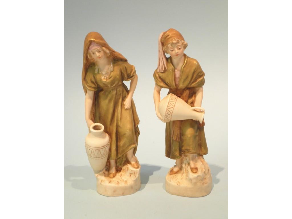 Appraisal: A pair of Royal Dux figures of gentleman and lady