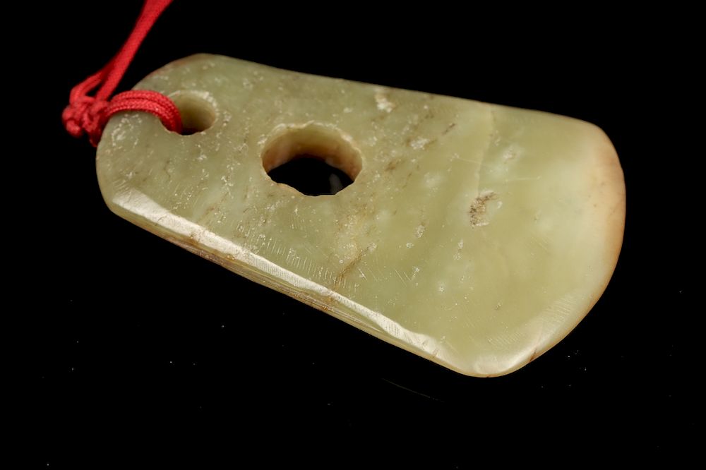 Appraisal: EARLY MINIATURE JADE AXE TOOL Of a jade axe carving