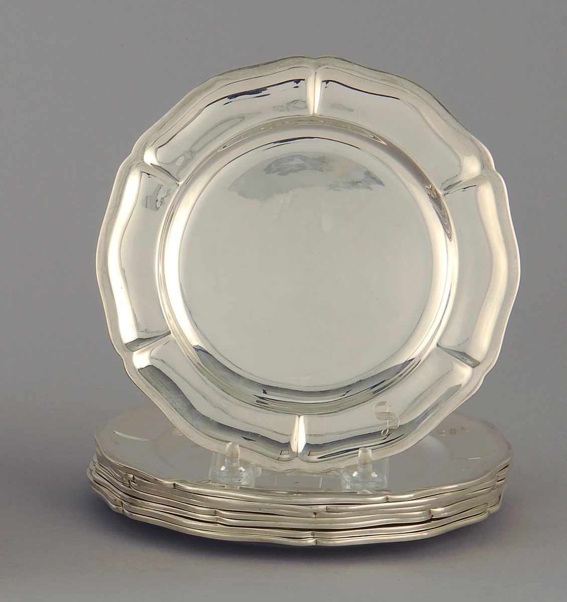 Appraisal: EIGHT MEXICAN SILVER SALAD PLATES BY CONQUISTADOR OF MEXICO CITY