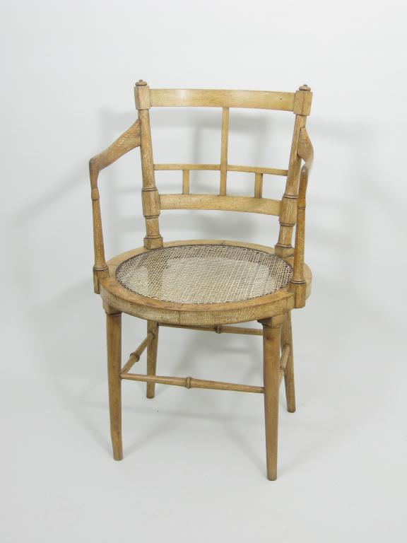 Appraisal: An E W Goodwin style Library Chair in Old English