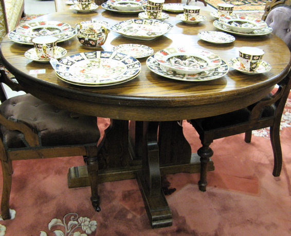 Appraisal: ROUND OAK PEDESTAL DINING TABLE WITH LEAF American th century