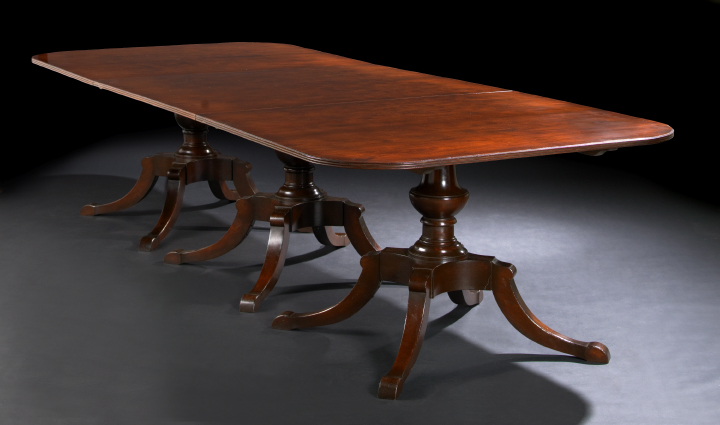 Appraisal: George III-Style Mahogany Dining Table the rounded rectangular top with