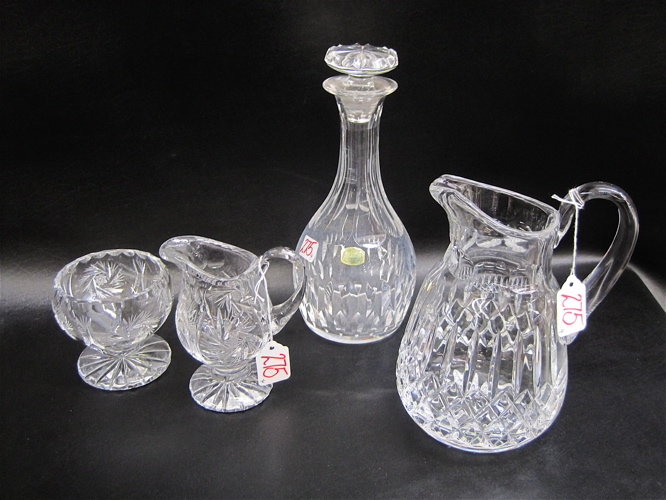 Appraisal: FOUR CLEAR CUT GLASS VESSELS decanter H pitcher H together