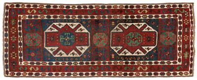 Appraisal: Caucasian rug two large central medallions with green and ivory