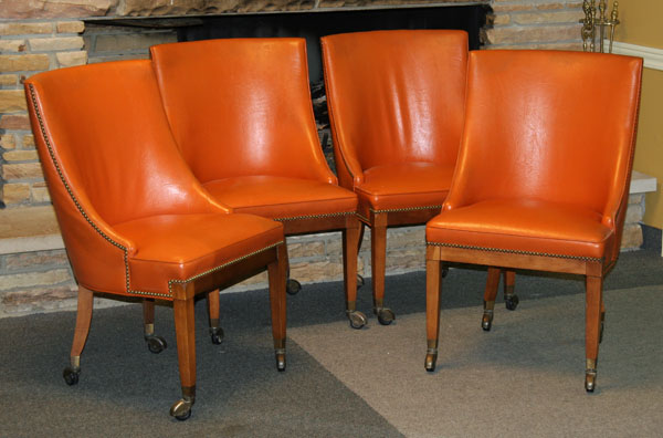 Appraisal: Set of four s vintage modern orange faux leather upholstered