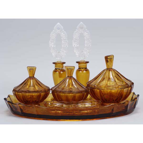 Appraisal: Pressed Amber Glass Dresser Set and Two Amber Glass Perfume