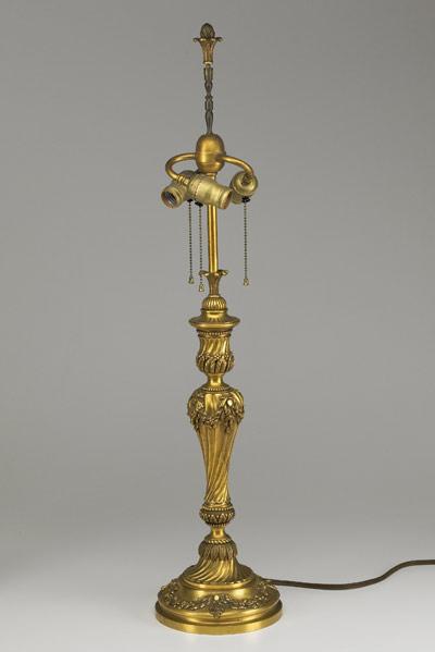 Appraisal: BRONZE COLUMN LAMP With vine decorated twisted columns early th