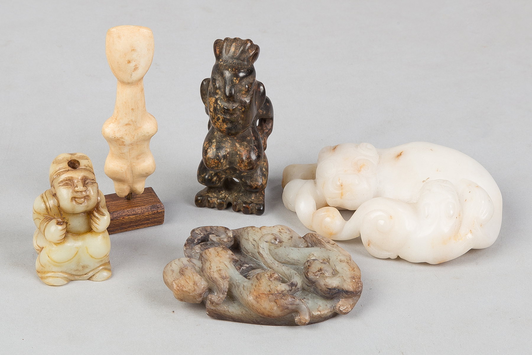 Appraisal: Various Jade and Hardstone Figures th Century Figure second from