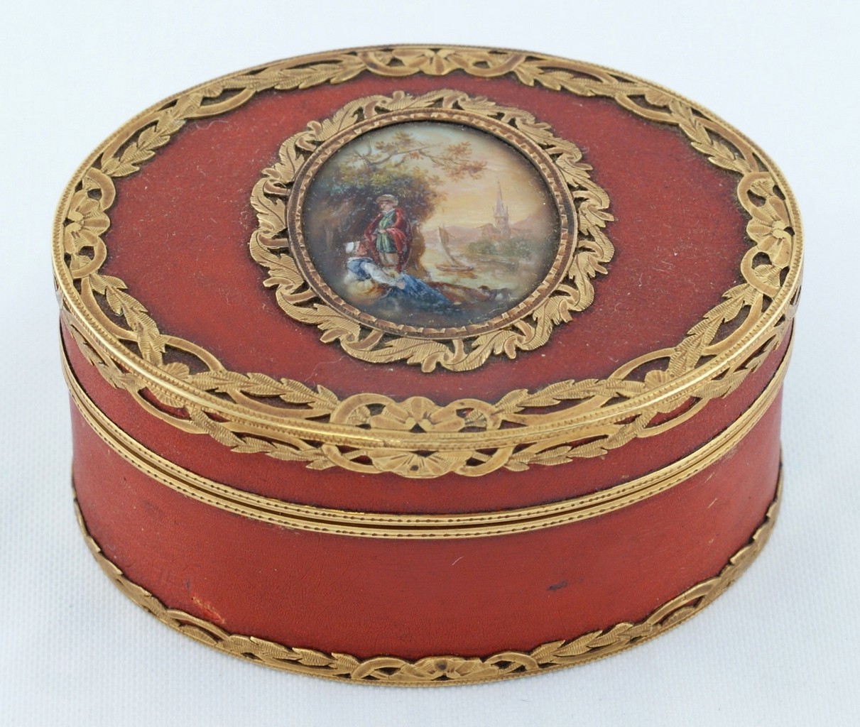 Appraisal: Oval high karat YG red lacquered and tortoise box with