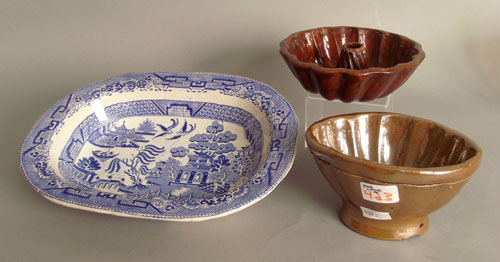 Appraisal: Two redware molds th c together with a Staffordshire blue