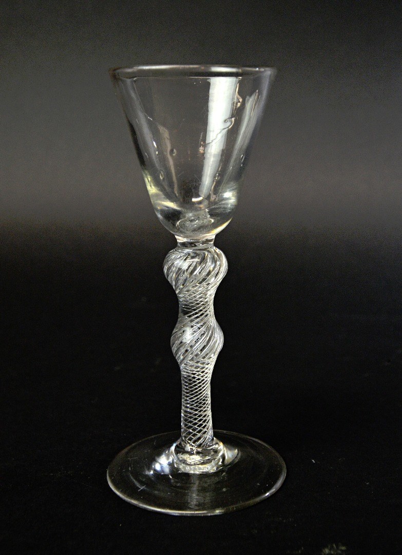 Appraisal: An English wine glass circa with rounded funnel bowl and