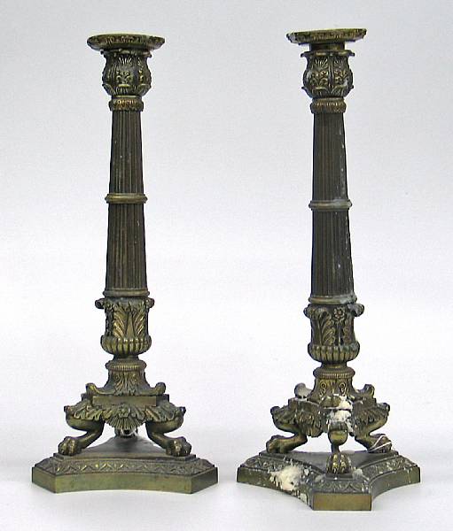 Appraisal: A pair of Charles X style brass candlesticks th century