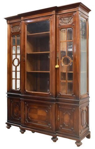 Appraisal: French breakfront bookcase early th c molded cornice three glazed