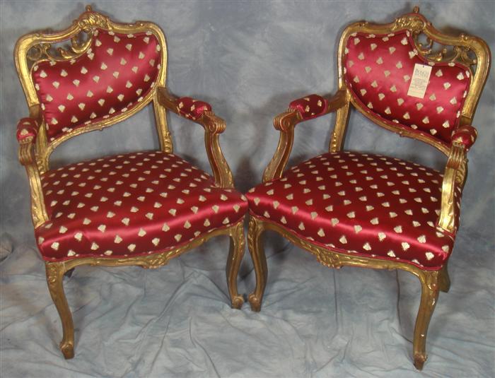 Appraisal: Pair of carved French style arm chairs burgundy silk fabric