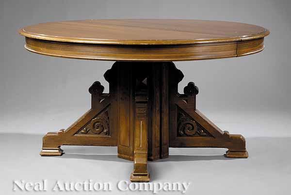 Appraisal: An American Modern Gothic Carved Walnut Pedestal Dining Table late