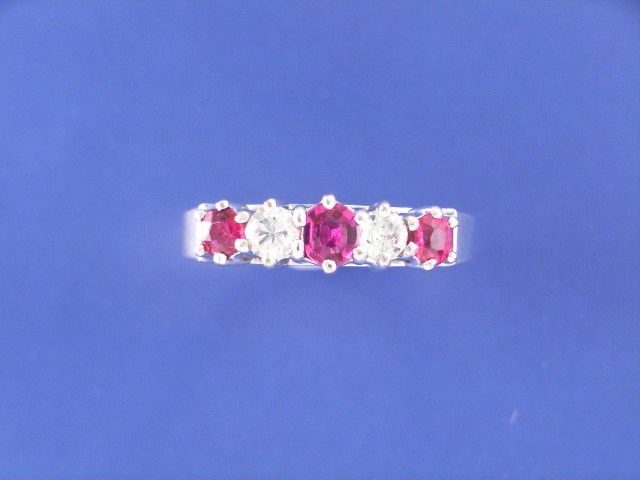 Appraisal: An ct white gold three ruby and two diamond set