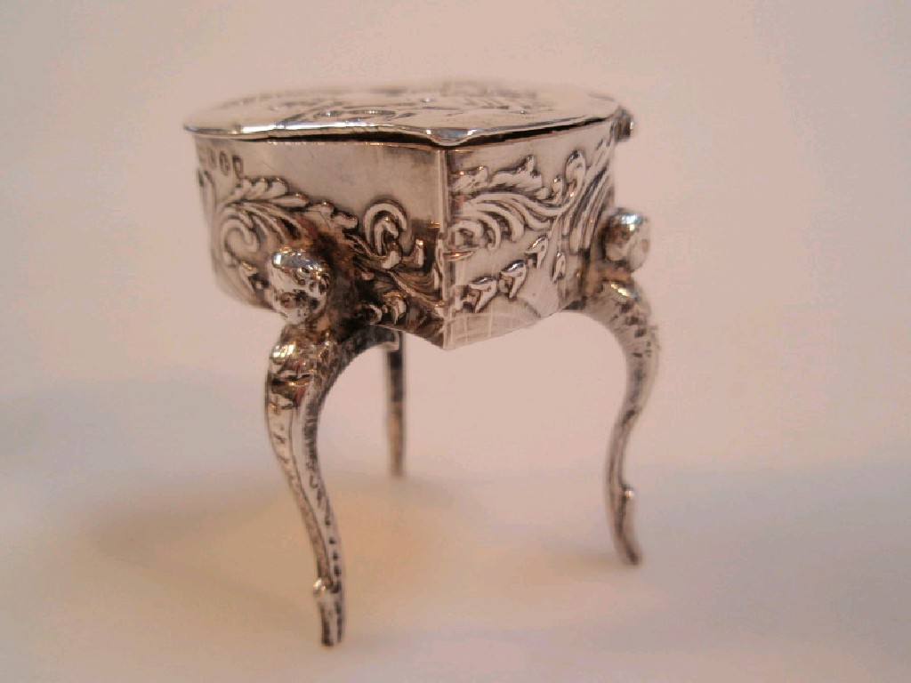 Appraisal: A small late Victorian silver heart shaped casket embossed with