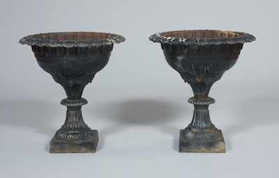 Appraisal: A Pair of Cast Iron Garden Urns Each apprx D