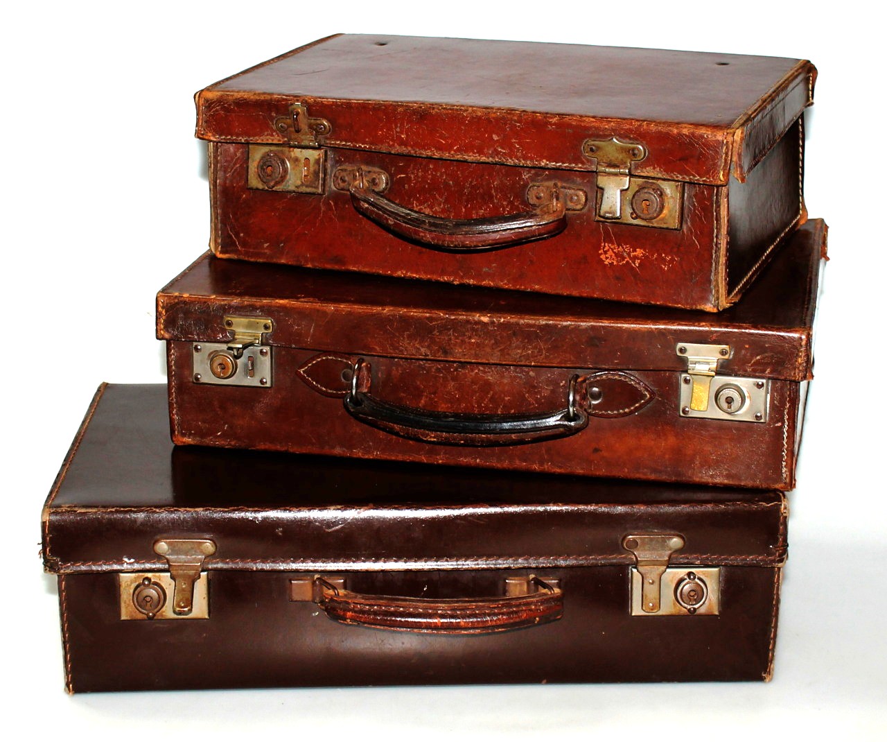 Appraisal: A mid- thC brown leather travel case with metal and