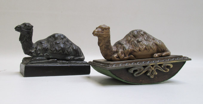 Appraisal: TWO SEATED CAMEL SCULPTURES early th century One is an