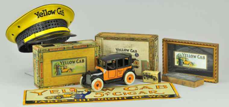 Appraisal: ARCADE YELLOW CAB Cast iron painted in familiar yellow and