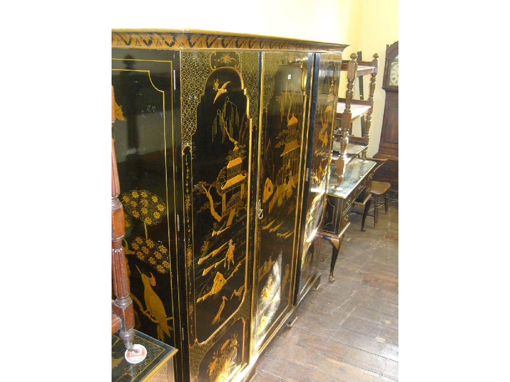 Appraisal: An Edwardian -piece black lacquered bedroom suite comprising triple wardrobe