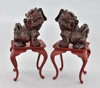 Appraisal: A Pair of Carved Wood Foo Dogs th Century With