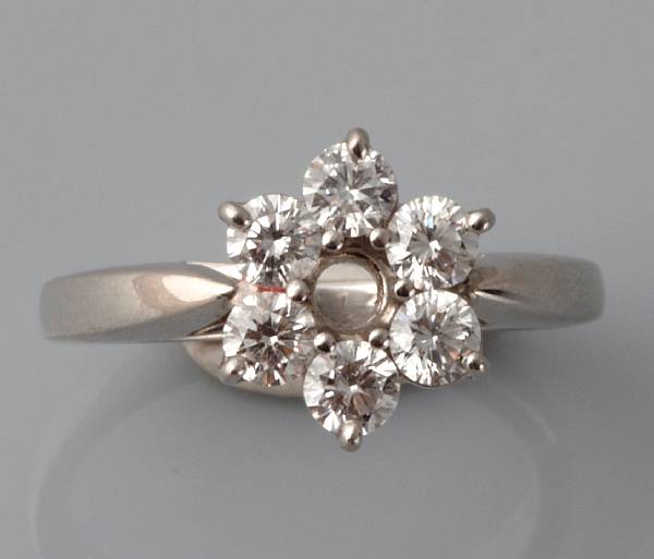 Appraisal: A diamond and platinum floret ring Neiman Marcus