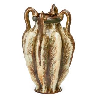 Appraisal: MARTIN BROTHERS Large vase with snake handle MARTIN BROTHERSLarge stoneware