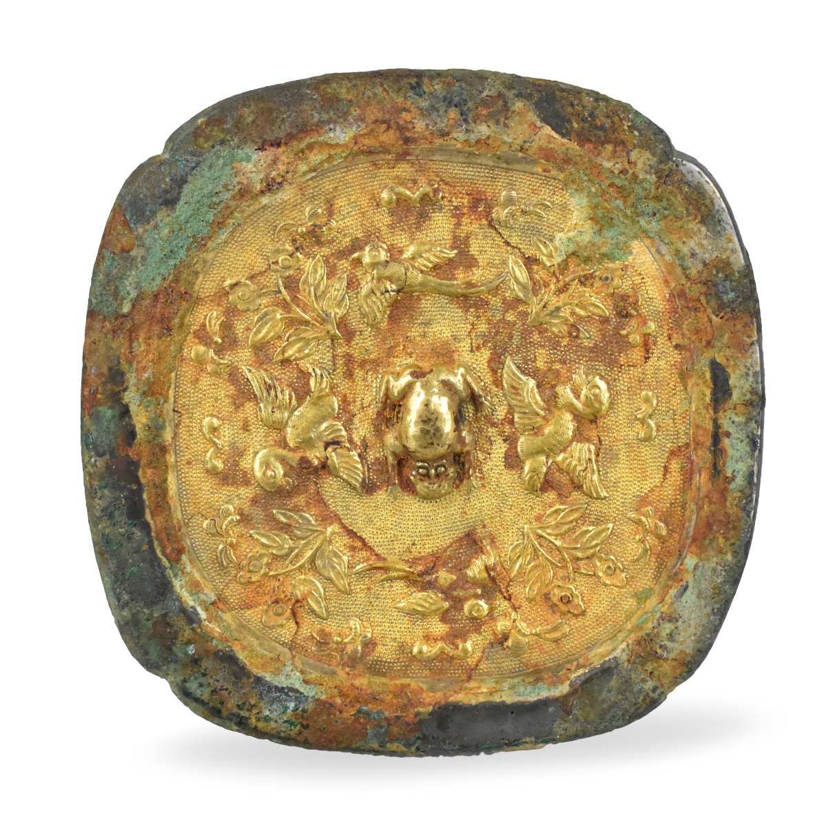 Appraisal: A Chinese gilt bronze mirror with birds and flower dating