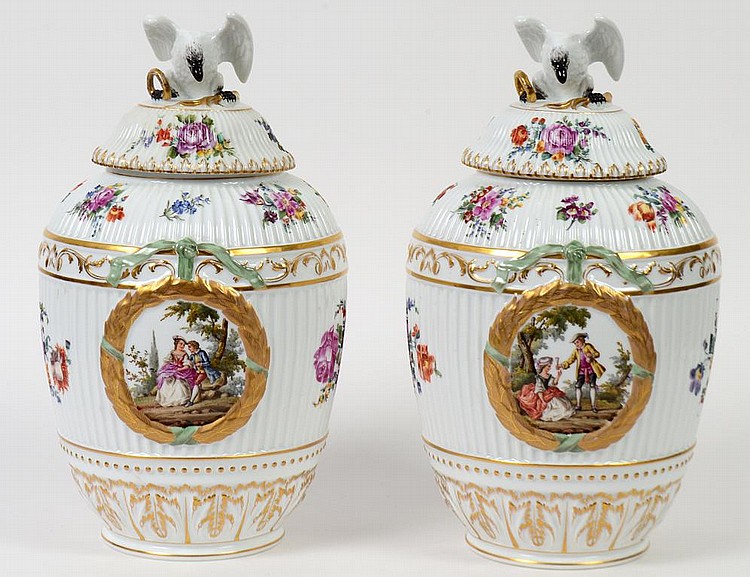 Appraisal: PAIR OF GERMAN PAINTED PORCELAIN COVERED BALUSTER VASESKPM Each with