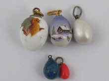 Appraisal: Five enamelled Russian miniature porcelain eggs