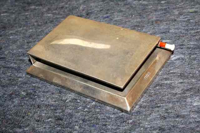 Appraisal: A SILVER NOTE PAD HOLDER rectangular shaped with hinged rising