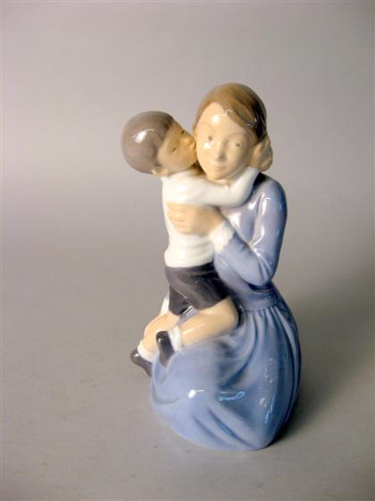 Appraisal: Royal Copenhagen porcelain figure of a mother and child Modeled