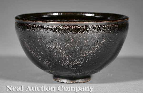 Appraisal: An Antique Chinese Oil Spot Temmoku Glazed Stoneware Tea Bowl