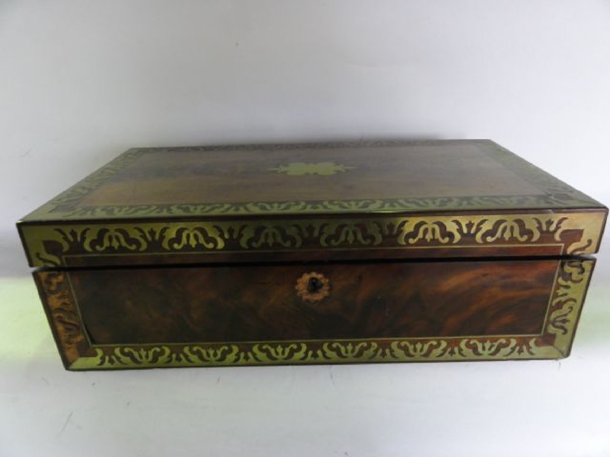 Appraisal: A Victorian mahogany veneered writing slope within extensive brass inlaid