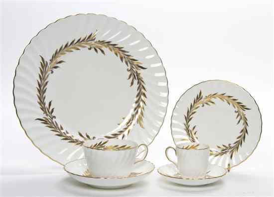 Appraisal: A Partial Minton Dinnerware Service in the Golden Symphony pattern