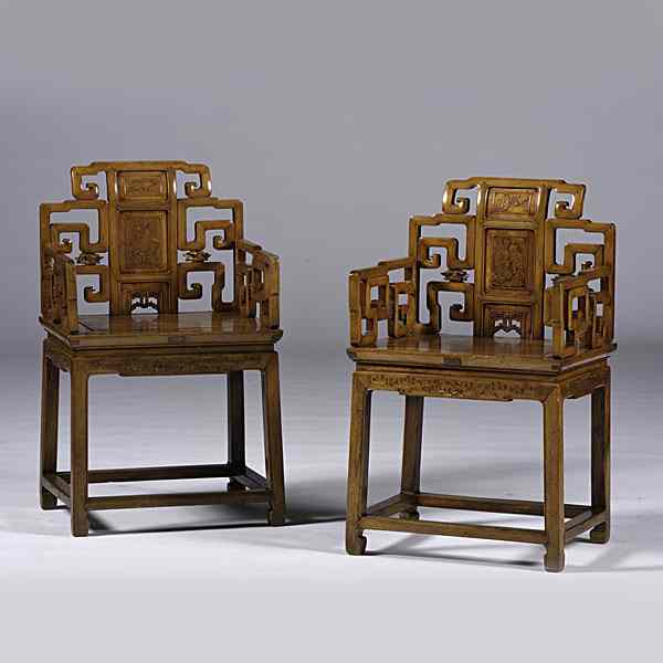 Appraisal: Chinese Ming-Style Arm Chairs Chinese A pair of hardwood carved