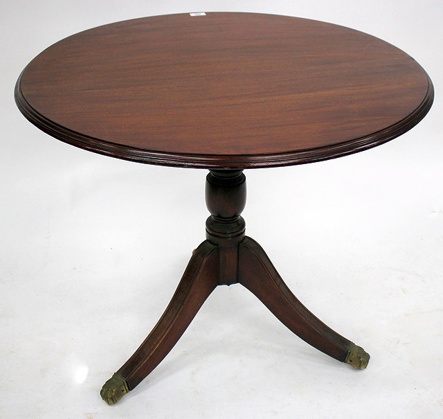 Appraisal: A VICTORIAN MAHOGANY CIRCULAR TILT TOP TRIPOD TABLE the top