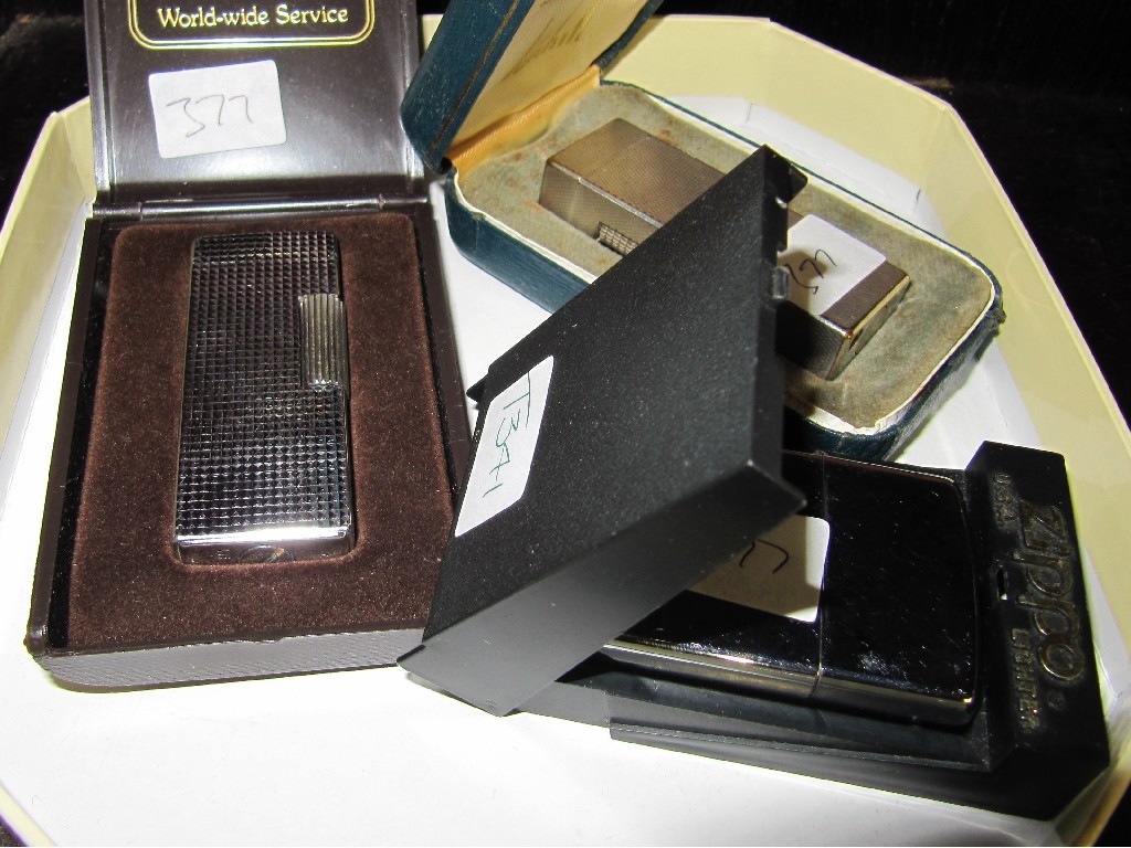 Appraisal: Lot comprising Dunhill lighter Zippo lighter and one other