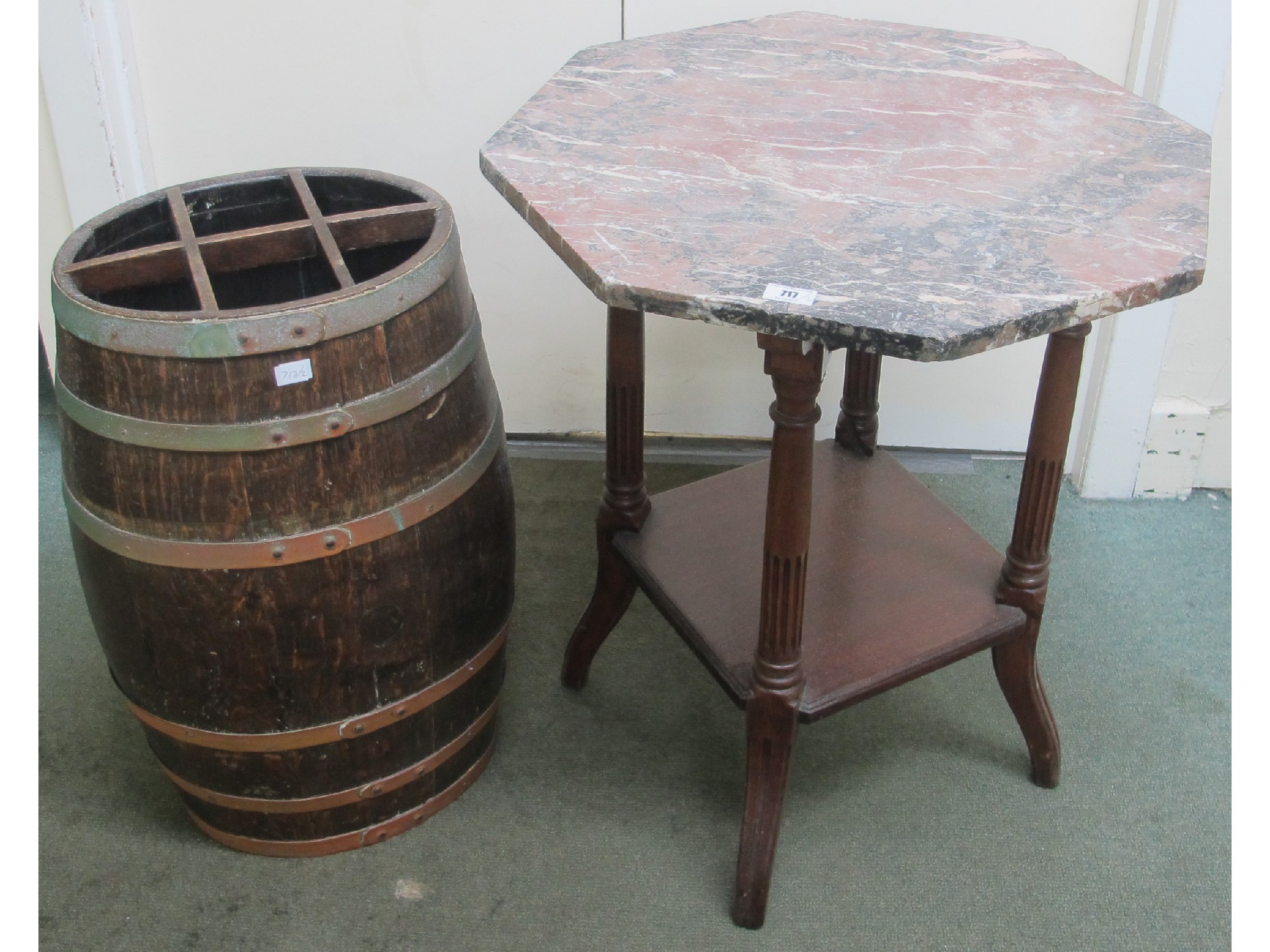 Appraisal: An oak barrel stick stand and an octagonal marble top