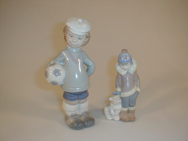 Appraisal: A Lladro figure of a young boy with a football