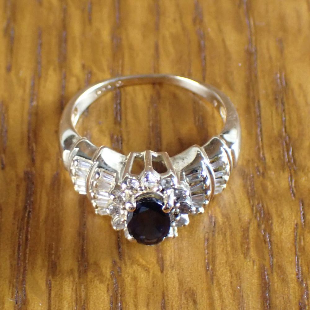 Appraisal: SAPPHIRE DIAMOND AND FOURTEEN KARAT GOLD RING with twelve round-cut