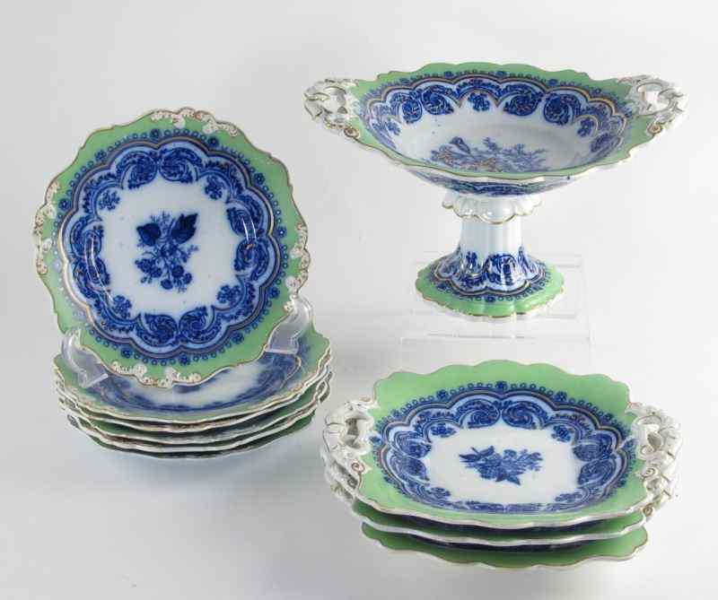 Appraisal: th Century Flow Blue Dessert Set piece set with gilt