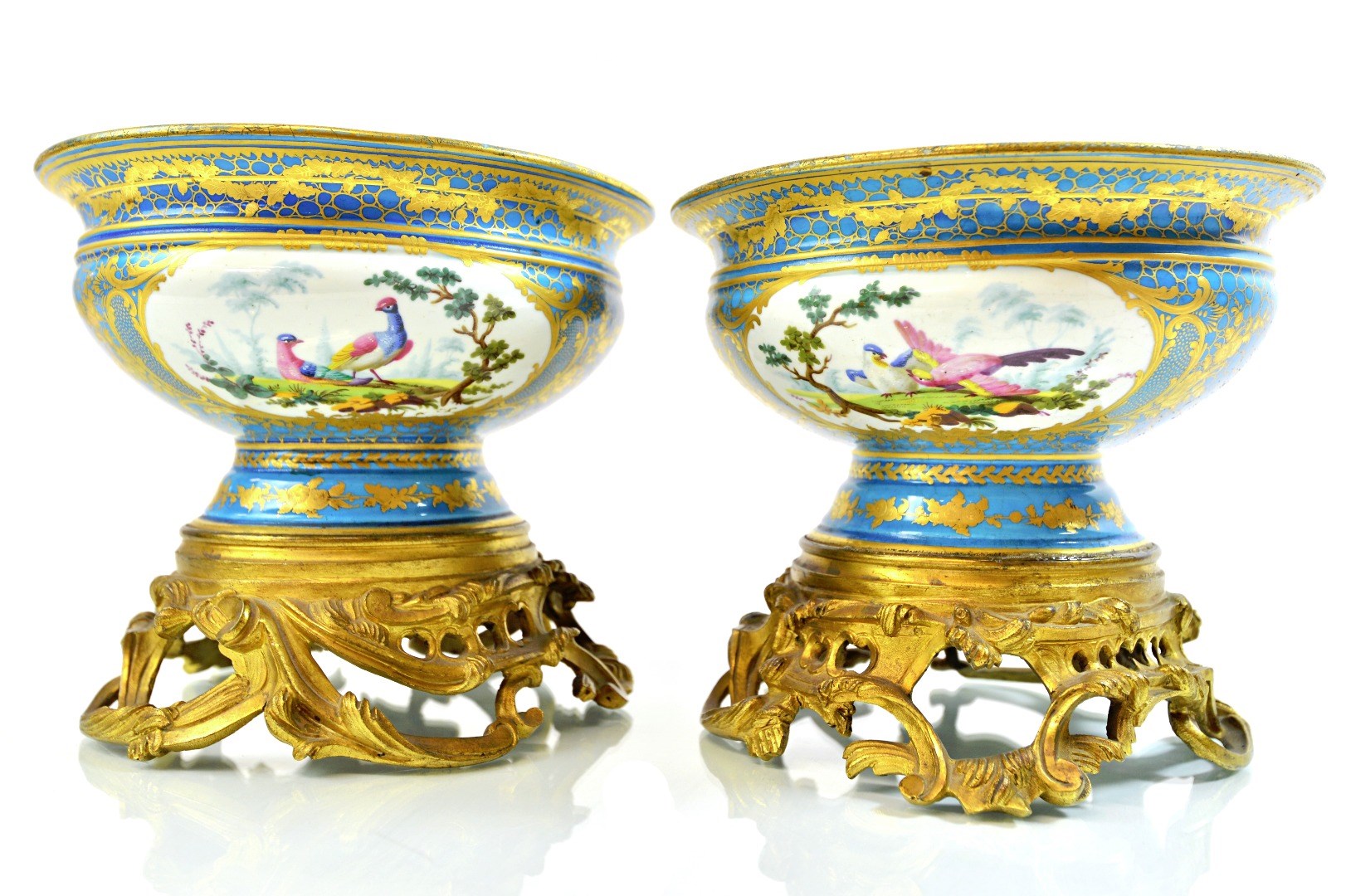 Appraisal: A pair of Sevres style turquoise ground gilt bronze mounted