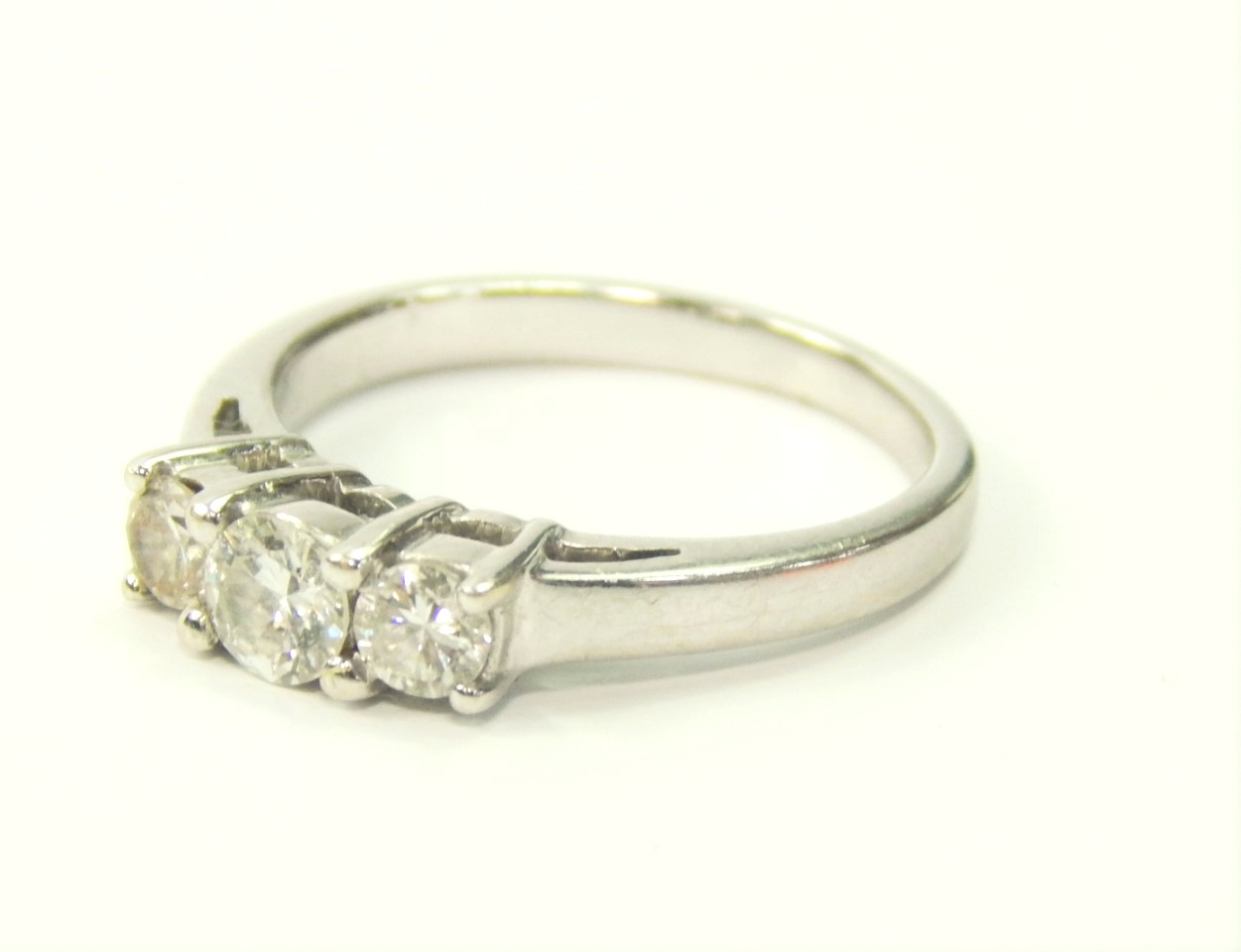 Appraisal: A white metal and diamond three stone ring approx cts