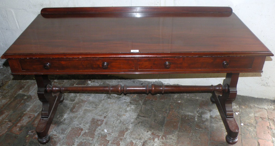 Appraisal: A Victorian mahogany side table the plain rectangular top raised