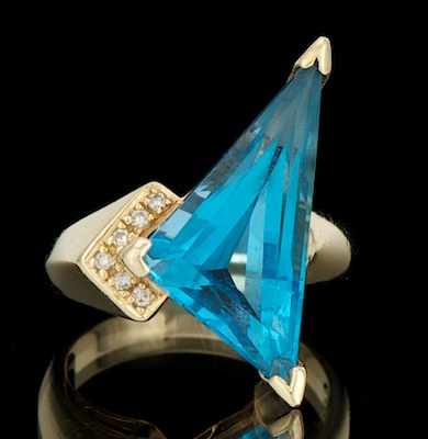 Appraisal: A Ladies' Blue Topaz and Diamond Ring k yellow gold