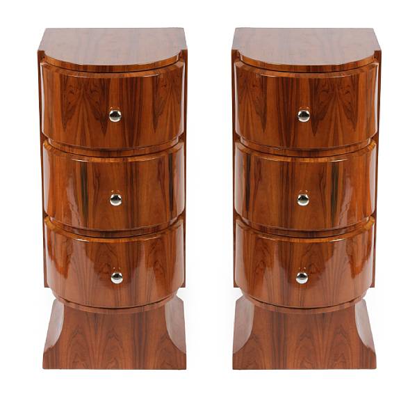 Appraisal: A pair of Art Deco style rosewood bedside cabinets height